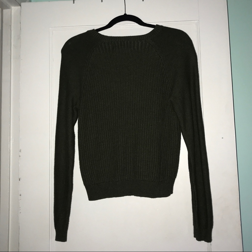 green sweater